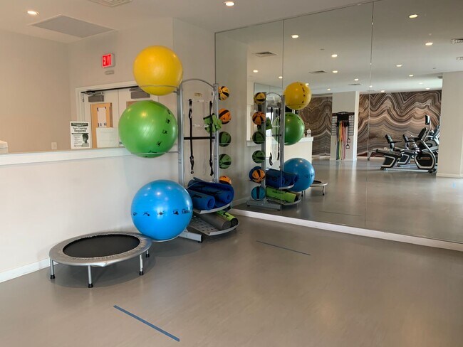 Building Photo - Gorgeous 2/2 with luxurious Lobby Level Condo in Hampden Row