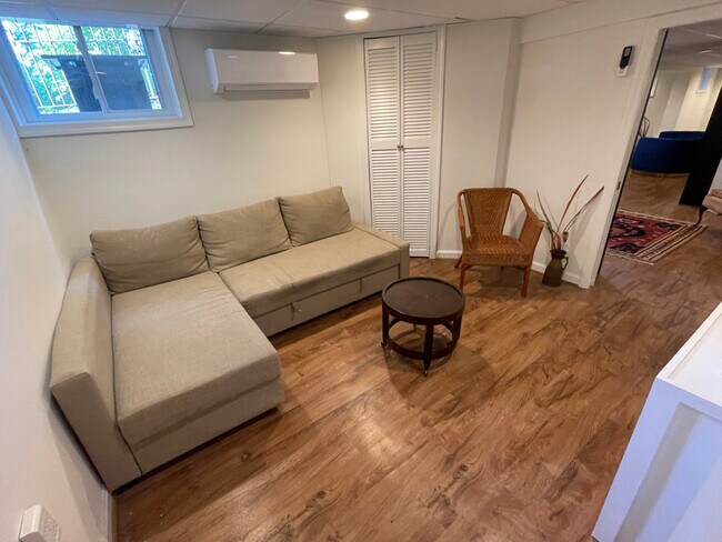 bedroom 2. Sectional converts to queen bed - 1869 Park Rd NW