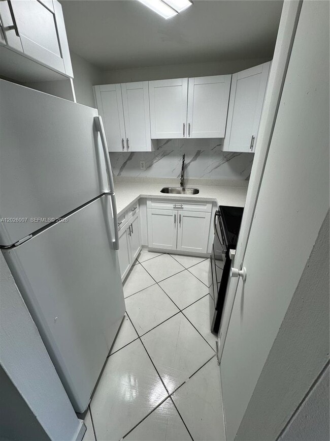 Building Photo - 1555 W 44th Pl