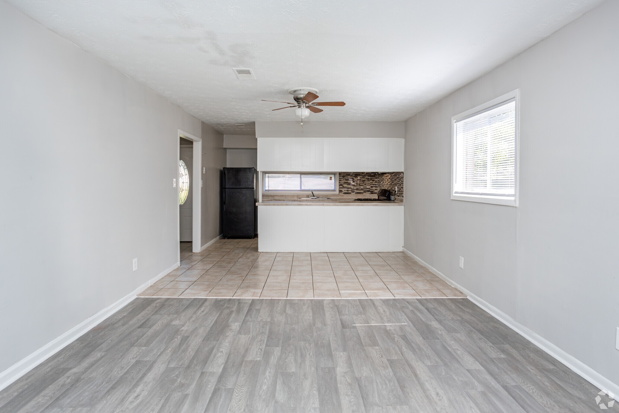 2BR, 1.5BA - 1,032SF - Living Room - Regal Forest Apartments