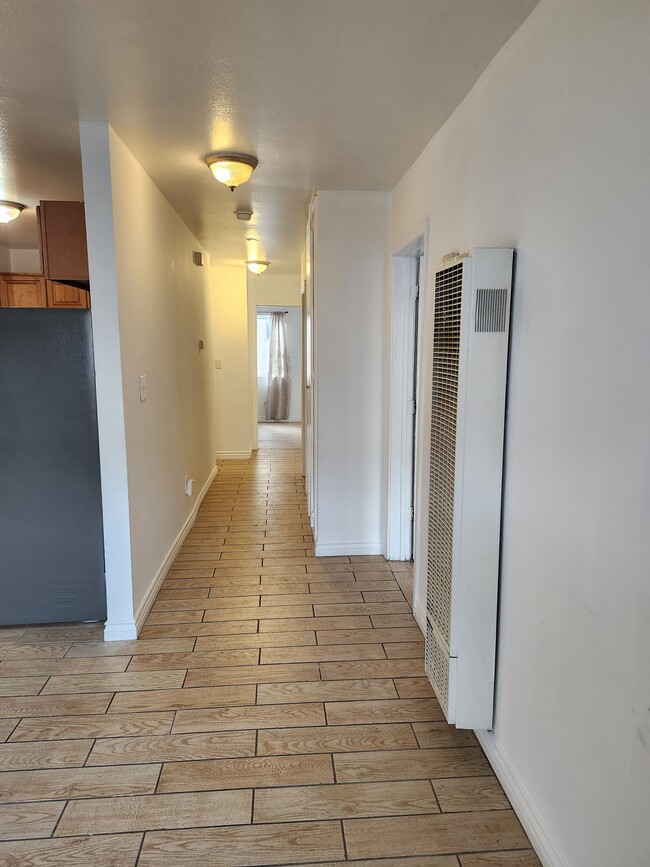 HALL WAY TO THE BEDROOMS - 2106 S Ridgeley Dr