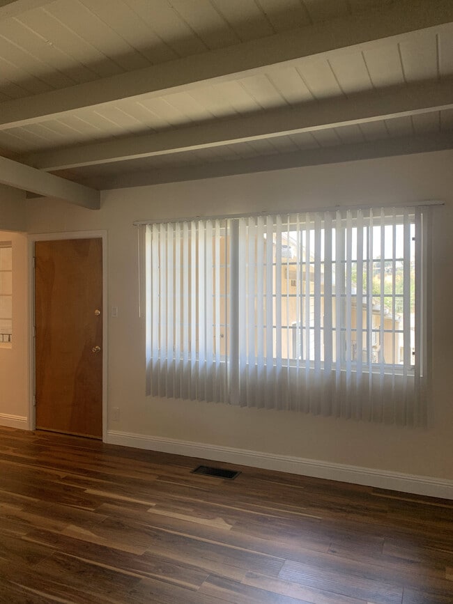 Midcentury entry door and exposed rafters - 1600 N Verdugo Rd