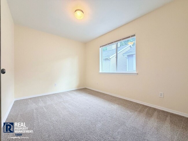Building Photo - Spacious 4-Bedroom Townhome in Alicia Meadows | Garage, Patio & Pet Friendly