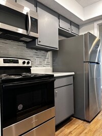 Building Photo - Charming 2-Bed, 1.5-Bath Condo with Carpor...