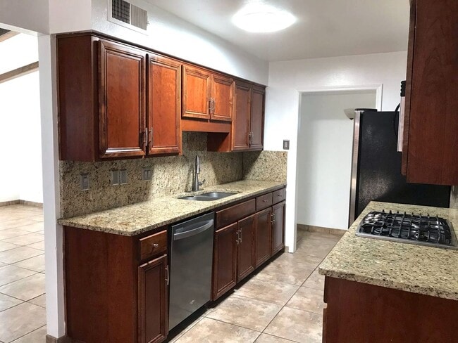 Building Photo - Amazing NE Heights Home! Tile Floors! This one won't last long!!