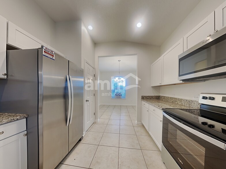 Building Photo - 9672 Woodstone Mill