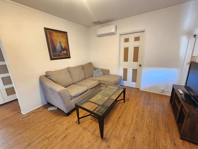 Building Photo - Coming Soon! Furnished One Bedroom with Bo...