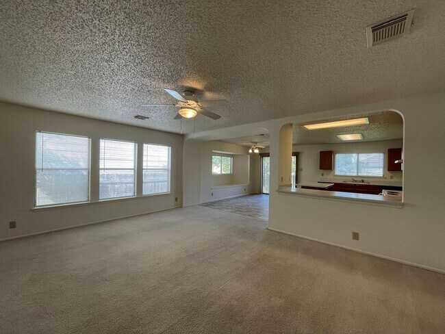 Building Photo - NICE 3 BEDROOM FEATURING AN ISLAND KITCHEN...
