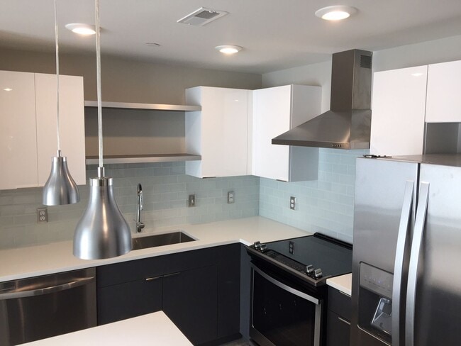 Building Photo - Rare Living Opening at Talbach Condominiums