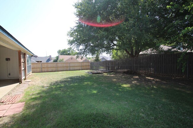 Building Photo - Corner Lot Charmer Off Chapel Creek | 4BR/2BA with Fireplace, Garden Tub & Fenced Backyard