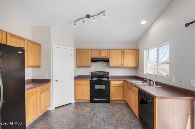 Building Photo - 22813 W Gardenia Dr