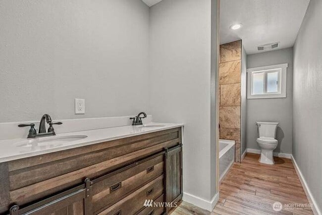 Building Photo - Remodeled open concept home with shop!