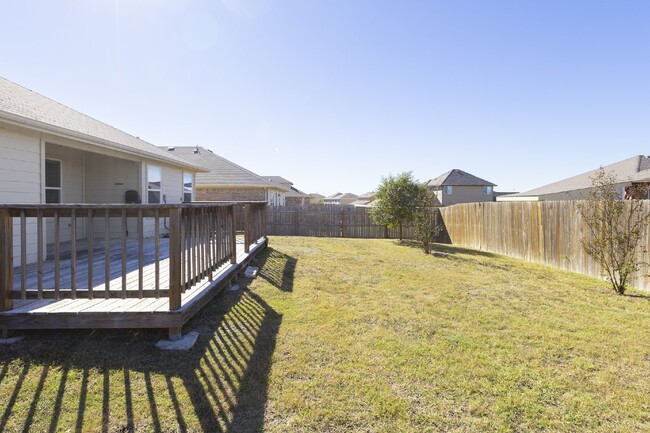 Building Photo - Kyle Home has Large Deck for Entertaining!