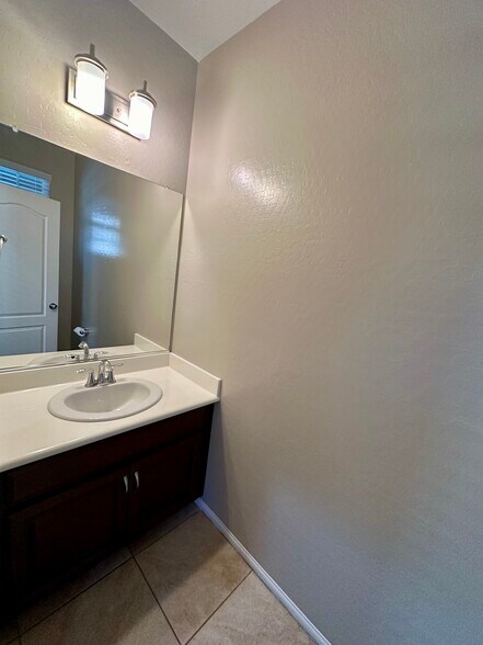 Half Bathroom on 1st Floor - 9341 W Pearblossom Sky Ave