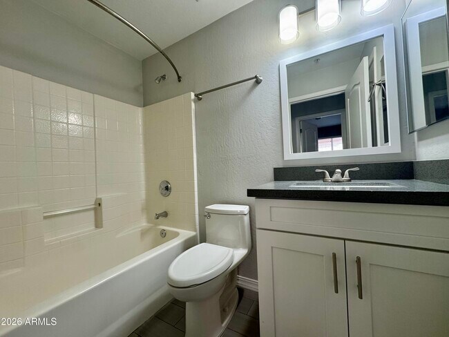 Building Photo - 8667 E Pinchot Ave