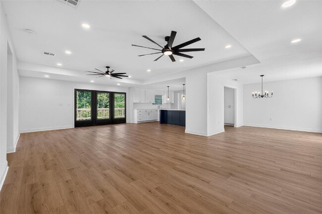 Building Photo - "Fully Remodeled 4-Bedroom Luxury Home Backing to a Greenbelt with Two Primary Suites!"