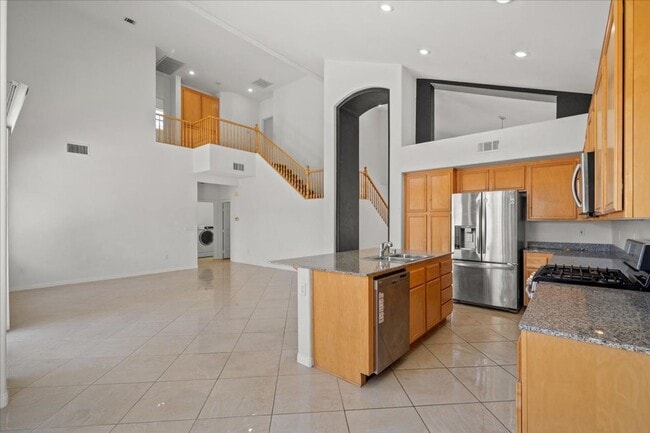 Building Photo - Contemporary Guard-Gated Retreat Near Rhodes Ranch Golf Club with Elegant Open-Concept Living