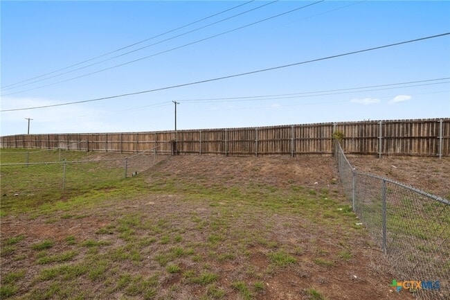 Building Photo - 903 Lasso Dr