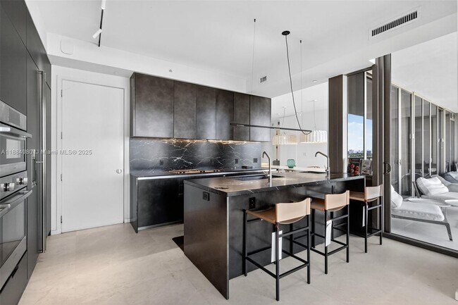 Building Photo - 9705 Collins Ave