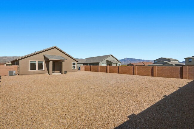 Building Photo - Modern Comfort Meets Desert Serenity – 4 Bed Rocking K Rental Home Available Now!