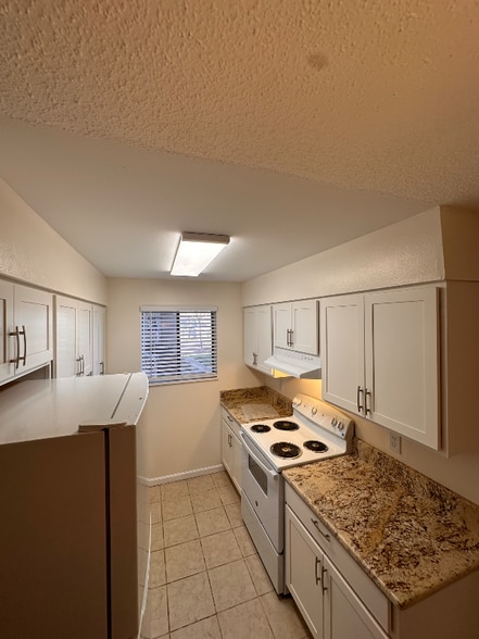 Building Photo - 9277 W 56th Pl