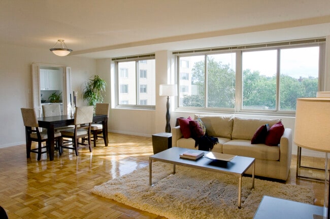 Dining and living area with hardwood flooring - The Albemarle