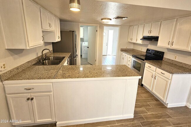 Building Photo - 8220 W Monaco Blvd