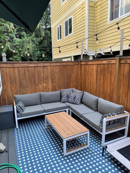 Private patio off dining room with trek deck. - 6337 Hillman Pl NE