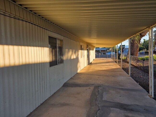 Building Photo - 1st Month Free!! 2 Bedroom/2Bath Mobile home with Arizona Room and Fully Fenced Yard.