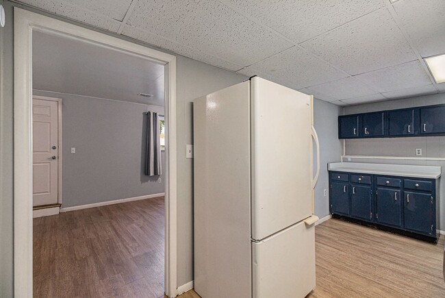 Building Photo - 7360 W.20th Ave. Unit B