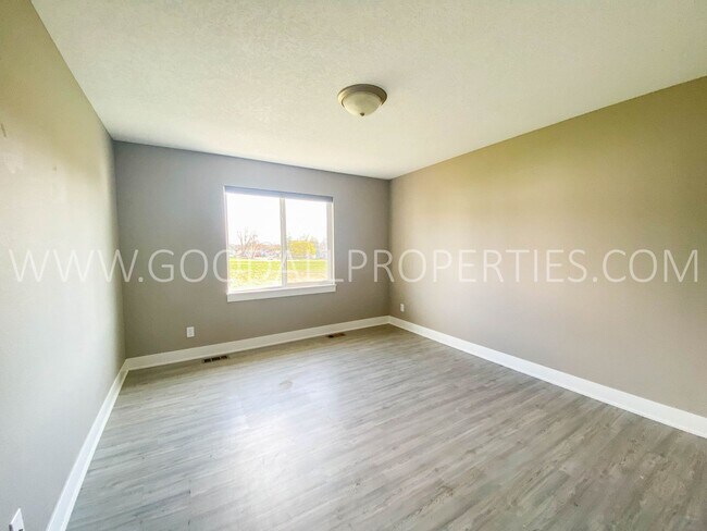 Building Photo - 4-Bedroom Walkout Ranch Home in De Soto with Finished Basement & Attached 2-Car Garage