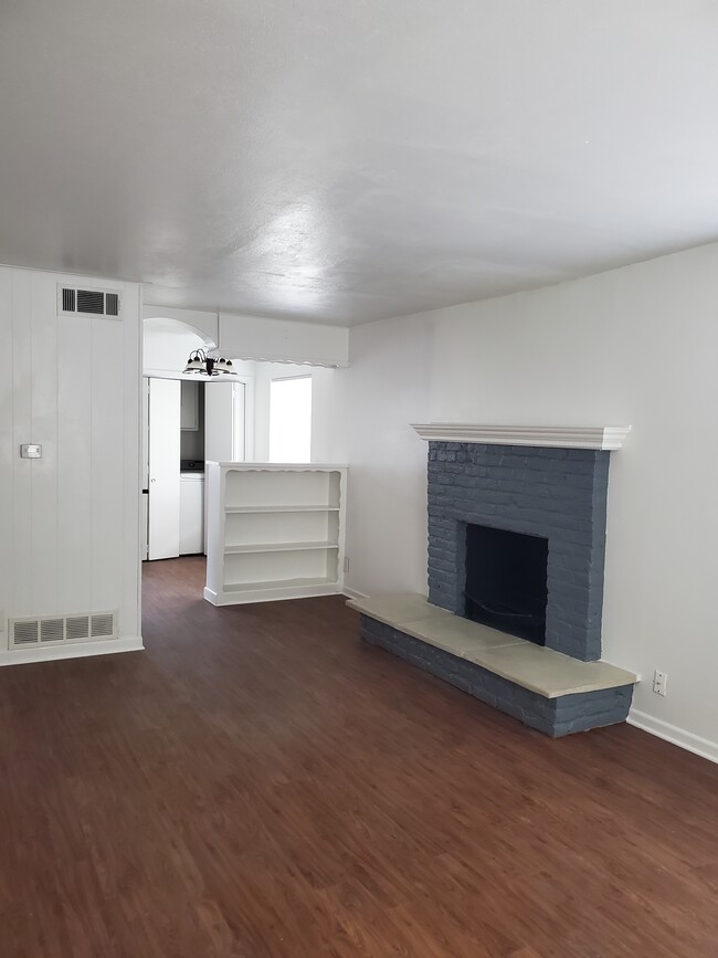 Fireplace! Built in bookshelf - 1907 W Shields Dr