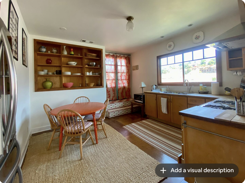 kitchen with doors leading to patio - 1619 1/2 Grafton St