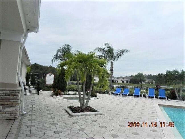 Building Photo - FURNISHED HOME IN THE GATED COMMUNITY OF T...