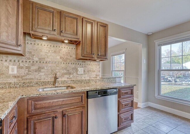 Building Photo - Updated End-of-Group Townhome with Finished Lower Level, Fenced Yard & Community Pool
