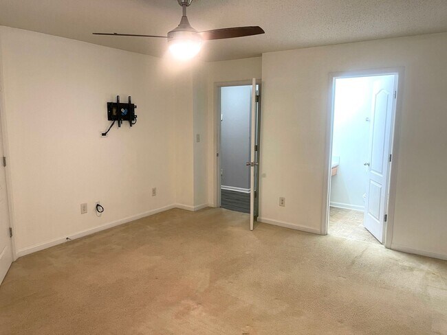 Building Photo - Welcome to this stunning 2-bedroom, 2.5 bathroom corner townhome located in the vibrant city of A...