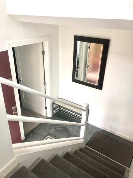 stairs going to 2 bedrooms downstairs - 7949 Caminito Dia
