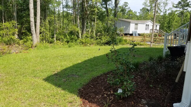 Building Photo - 5 bedroom / 4 bath home with a short drive to the beach!