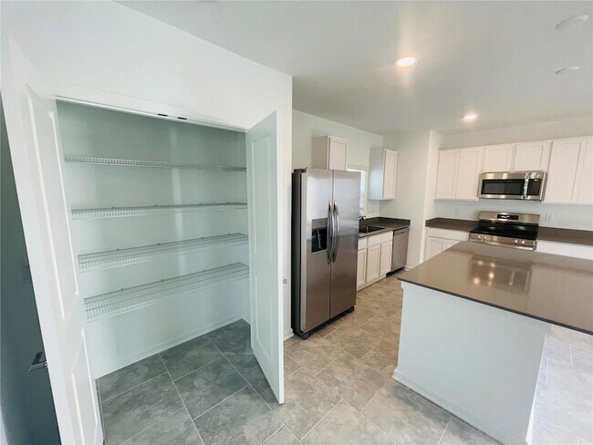Building Photo - 7238 Ivy Tendril Ave