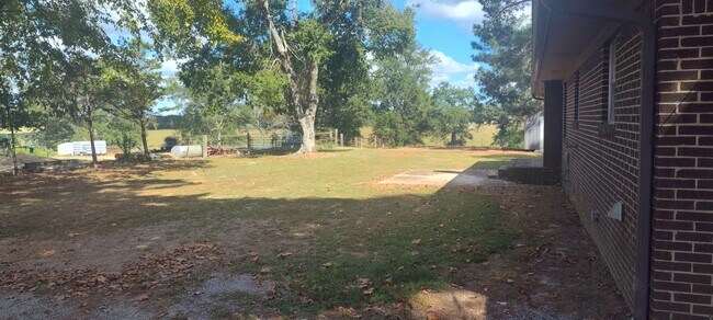 Building Photo - Beautiful corner country lot with lots of ...