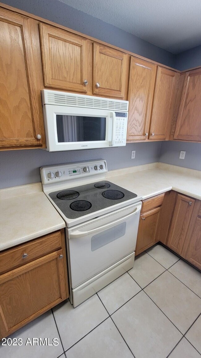 Building Photo - 5846 W Gelding Dr