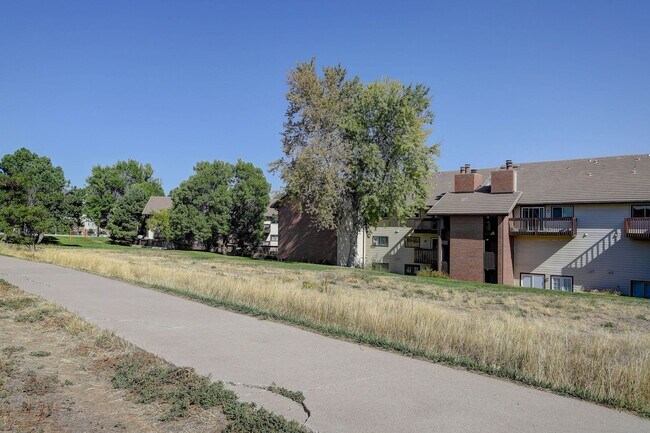 Building Photo - Penthouse level condo with views of canal and trail!