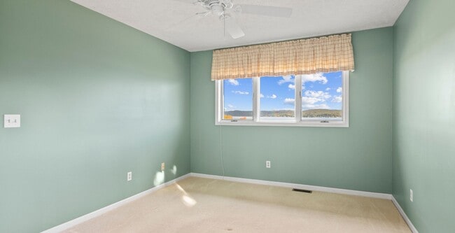 Building Photo - Lakefront End-Unit Condo with Crystal Lake...
