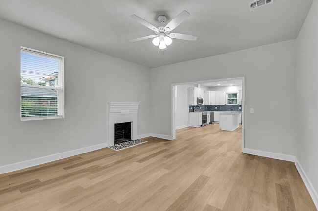 Building Photo - Cute all brick ranch on a large corner lot with fenced in yard and 1 car garage