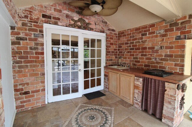 Building Photo - Stunning 3-Bed, 2-Bath Spanish-Inspired Custom Home with Elegant Gardens & Fountains