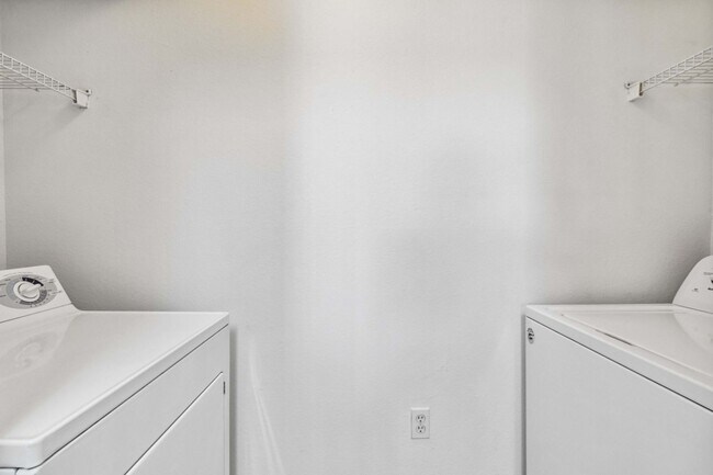 Building Photo - Spacious 1-Bedroom Condo for Annual Rent available now in gated Villagio Community