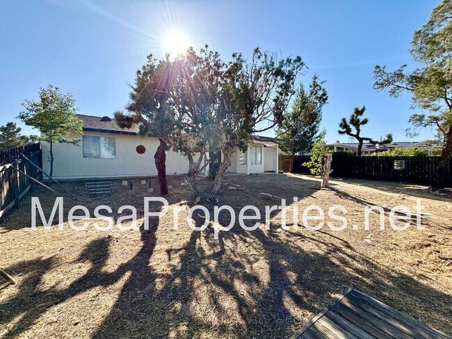 Building Photo - 7891 Corona Ave