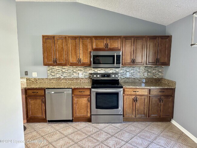 Building Photo - Charming Four Bedroom Home with a Beautiful Pond in the Back