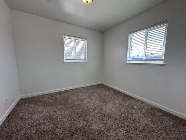 Building Photo - ~Move In Special- $500 Off One Months Rent~ Newly Remodeled Two-Bedroom Condo! Rent Includes Wate...