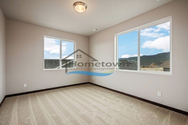 Building Photo - Woodbridge South Home with 4 Bedrooms and 3 Bathrooms in Post Falls build in 2021!